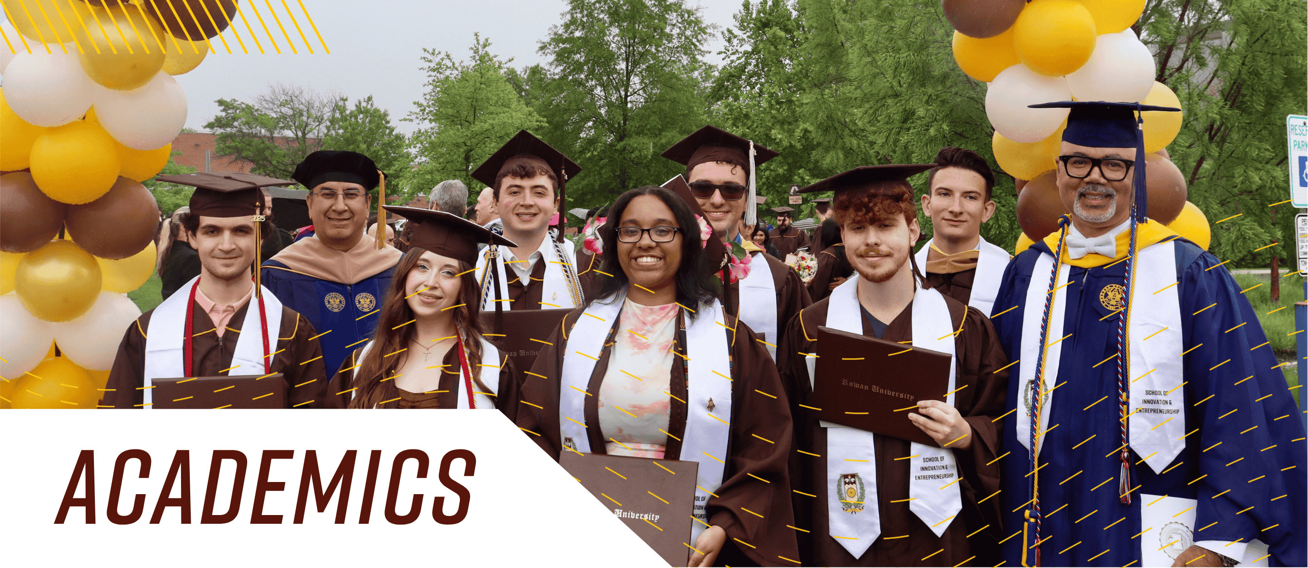 Banner text: Academics. Image shows classroom of students and a professor