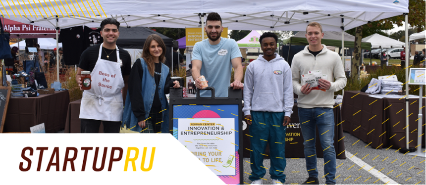 Banner text: StartupRU. Image shows a group of student entrepreneurs standing together